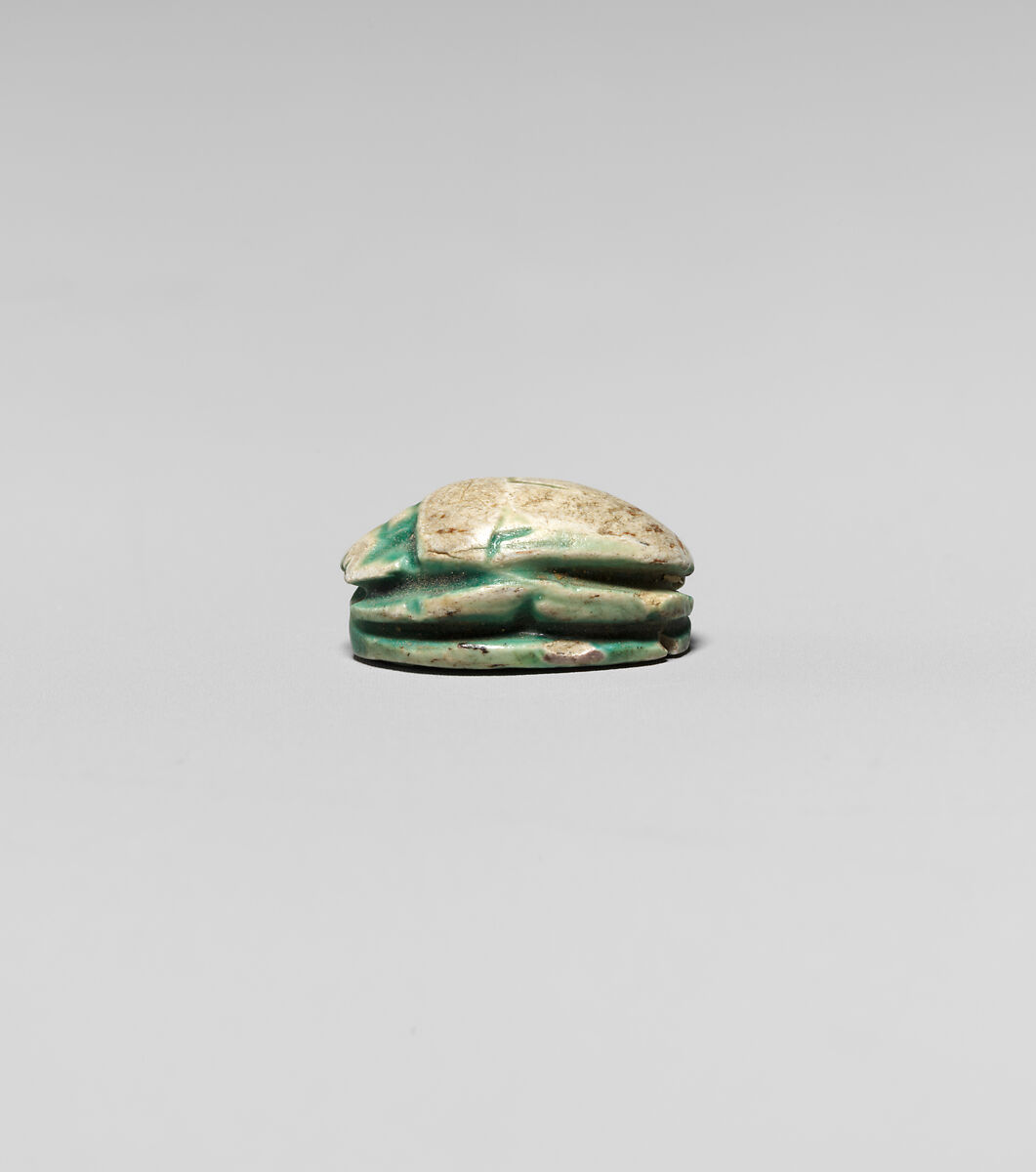 Scarab with Figure of Winged Seth-Baal, Green glazed steatite
