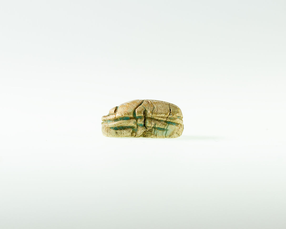 Scarab Decorated with Scroll, Steatite, traces of green glaze