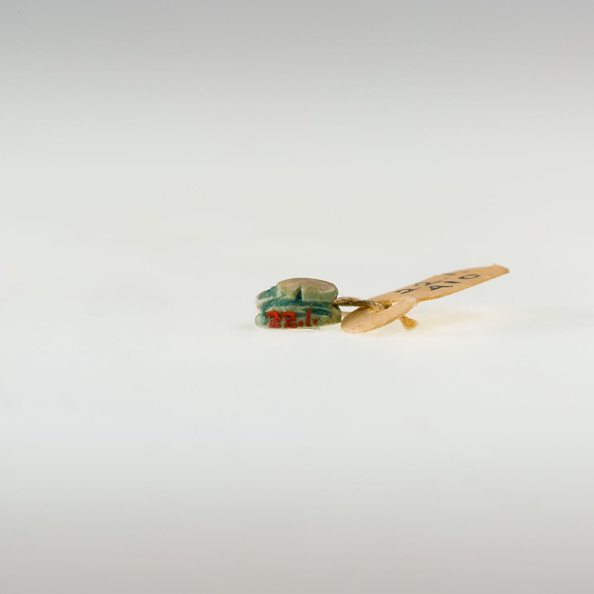 Scarab Inscribed with a Blessing Related to Re, Green glazed steatite