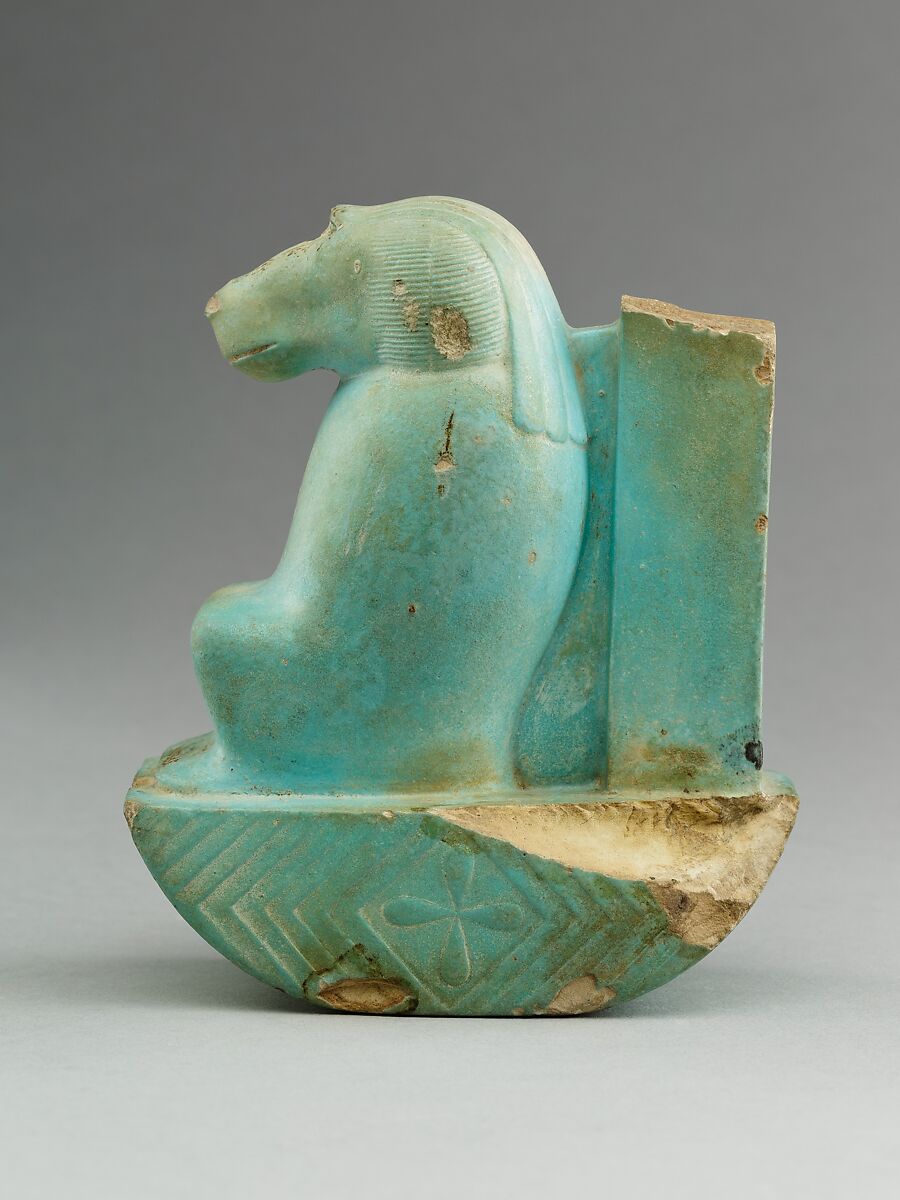 Figure of baboon on a basket and with a pillar (<em>shebet</em> offering), Faience, pale blue glaze