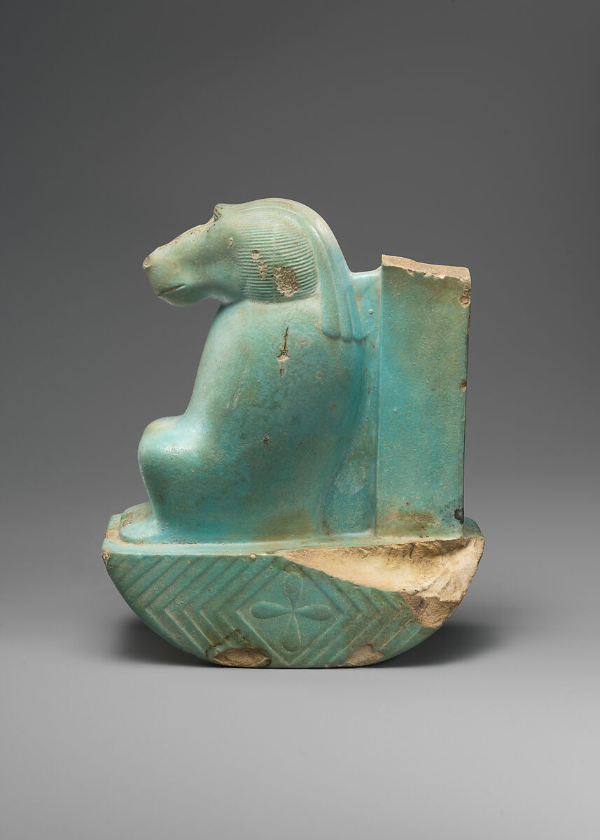 Figure of baboon on a basket and with a pillar (<em>shebet</em> offering), Faience, pale blue glaze