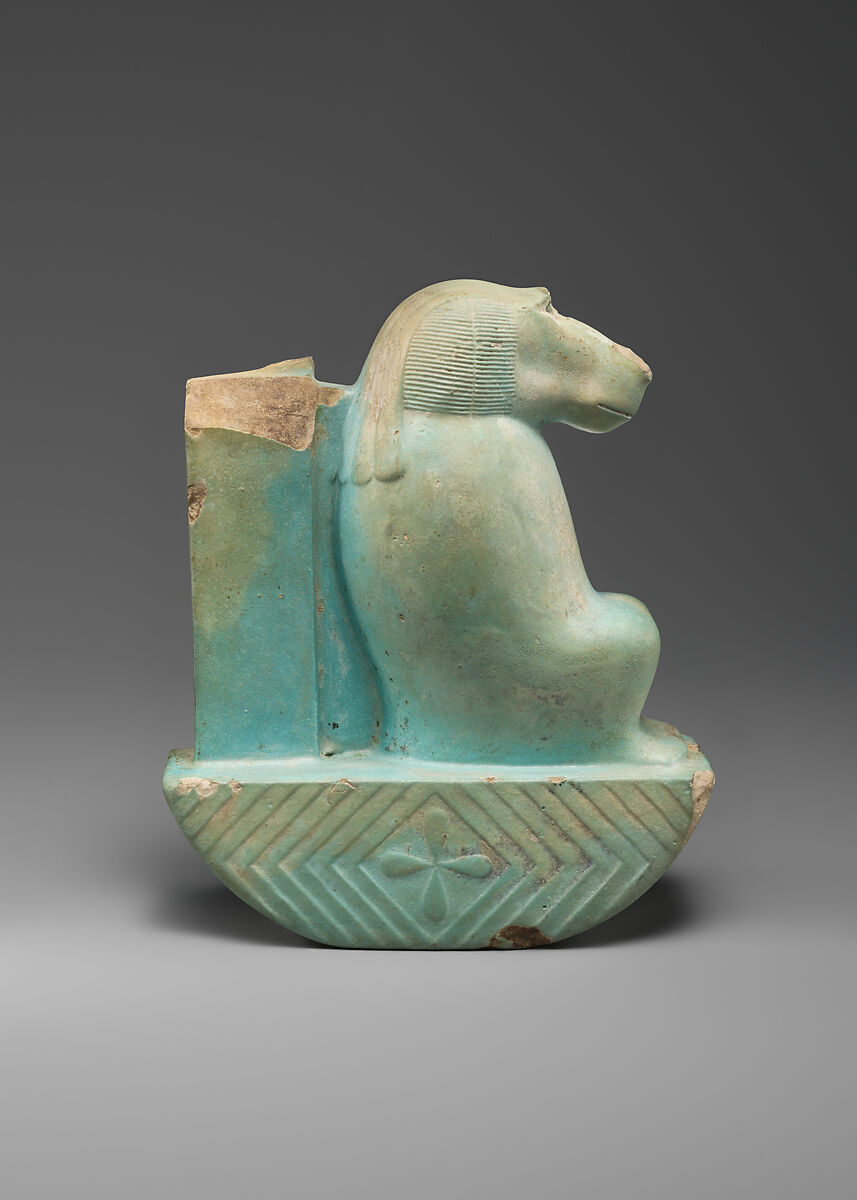 Figure of baboon on a basket and with a pillar (<em>shebet</em> offering), Faience, pale blue glaze