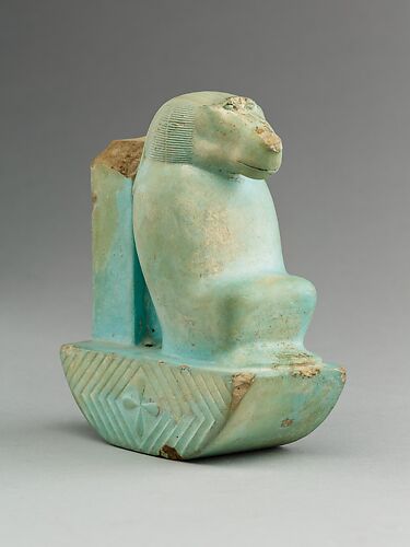 Figure of baboon on a basket and with a pillar, the shebet offering