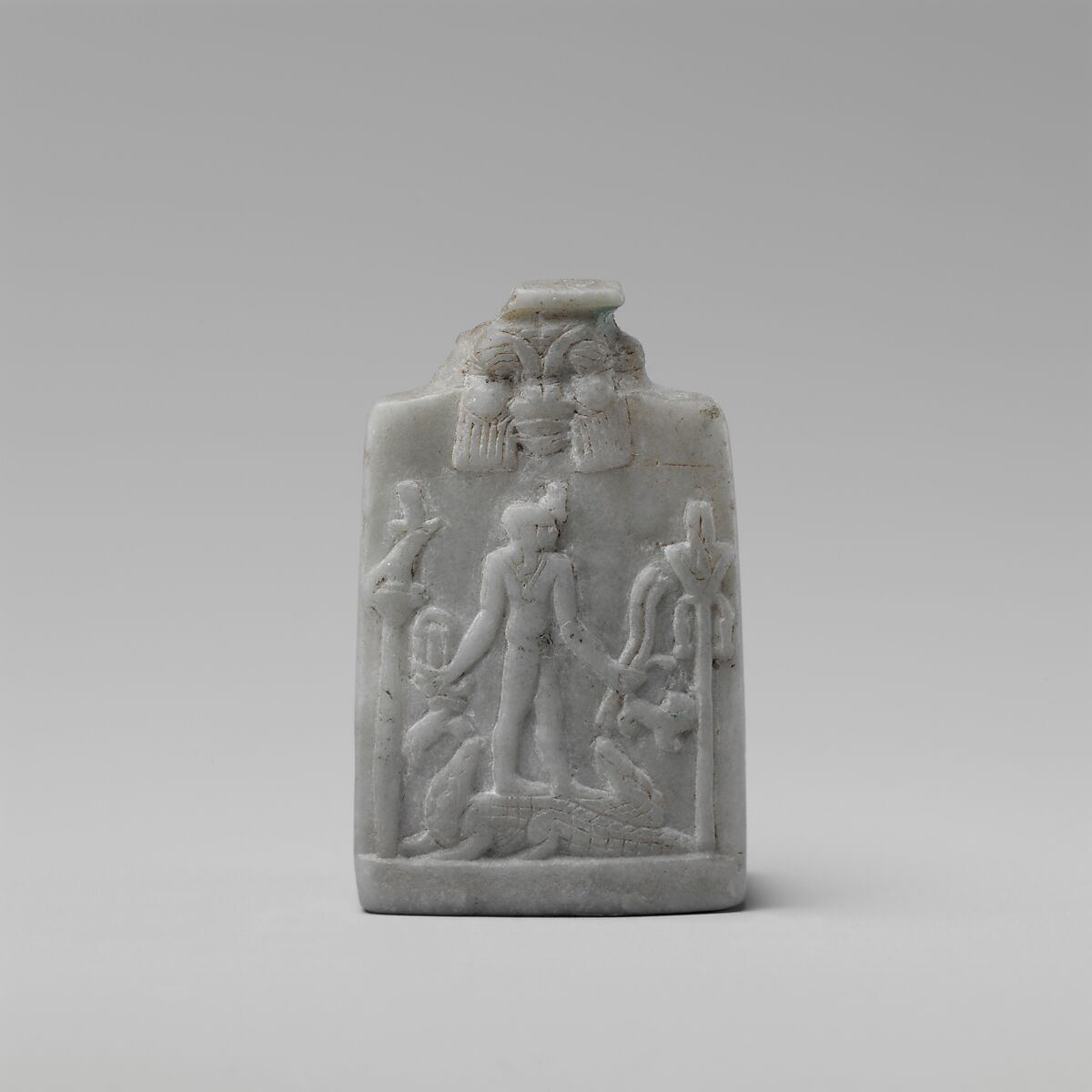 Miniature Cippus (magical stela) with Horus in profile wearing gazelle head on the forehead, Anhydrite 