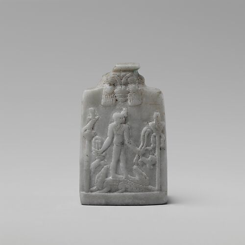 Miniature Cippus (magical stela) with Horus in profile wearing gazelle head on the forehead