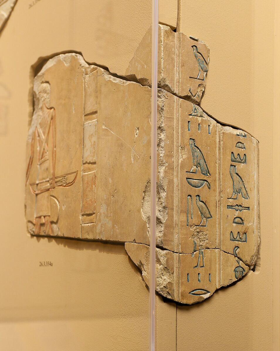 Inscribed block with bowman and dog, Limestone, paint