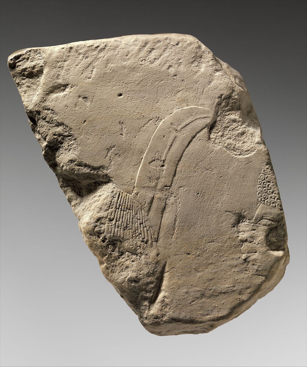 Relief fragment: foreigner with feather in his hair and Nubian, Limestone, paint 