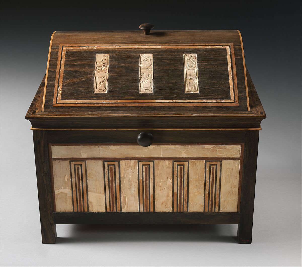 Inlaid box for cosmetic vessels of Sithathoryunet, Ebony, inlaid with ivory and red wood (restored), gold trim