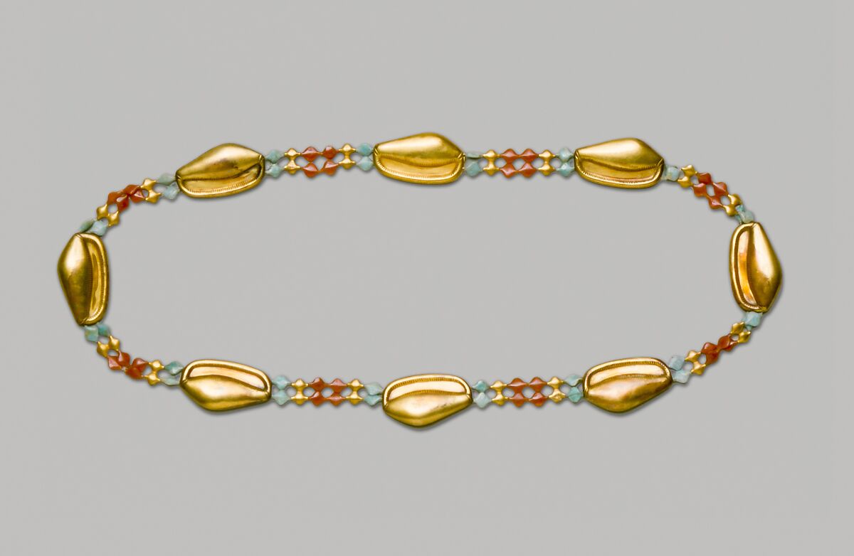 Cowrie Shell Girdle of Sithathoryunet, Gold, carnelian, feldspar, pellets of copper-silver alloy