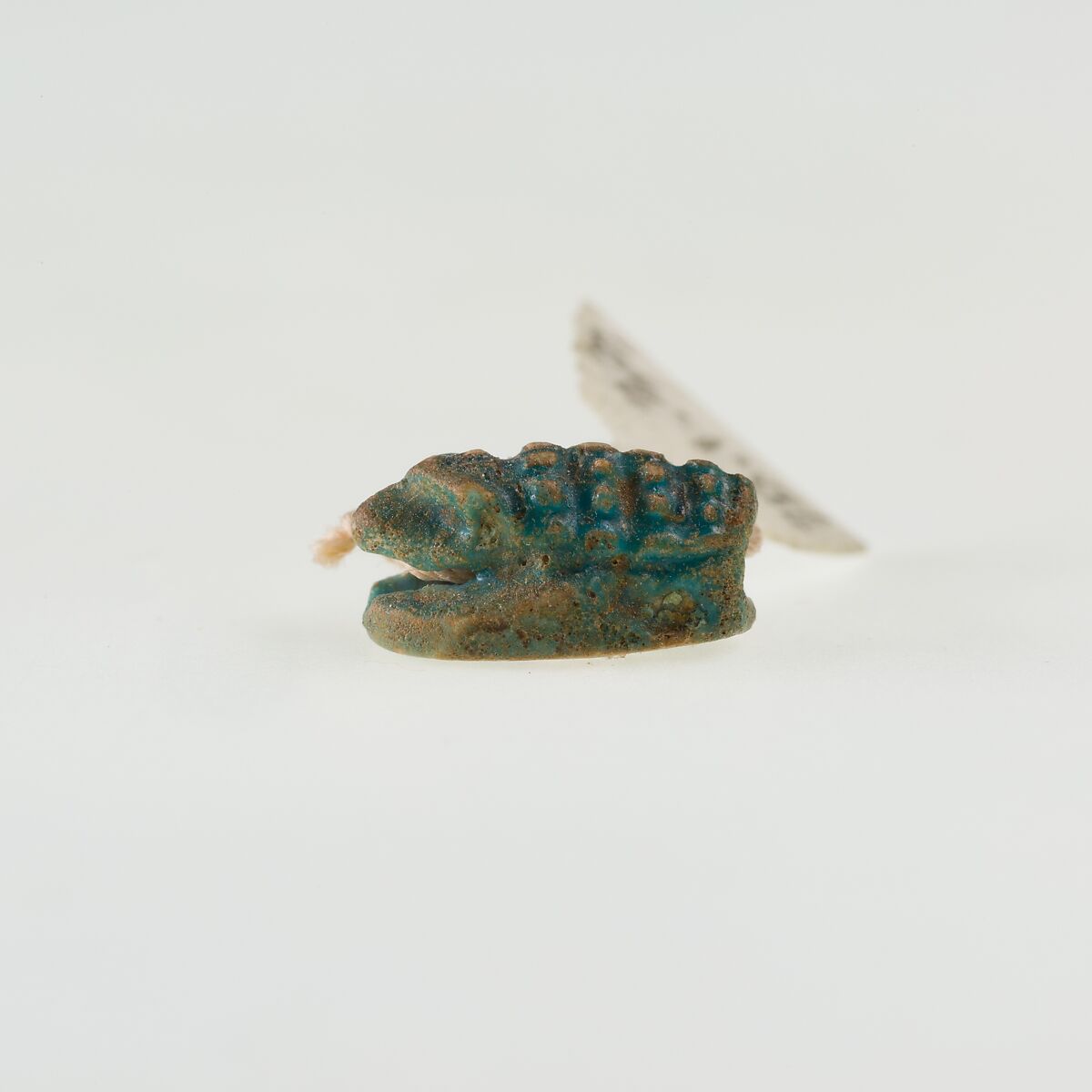 Scaraboid in form of hedgehog, Green glazed steatite