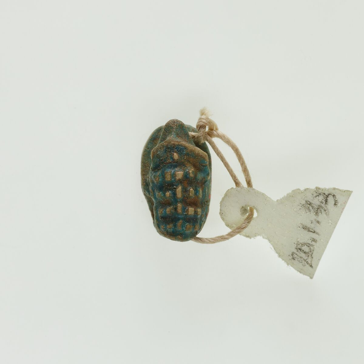 Scaraboid in form of hedgehog, Green glazed steatite
