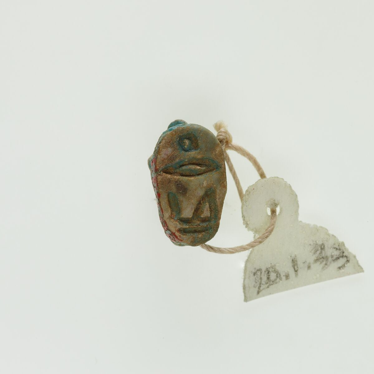 Scaraboid in form of hedgehog, Green glazed steatite