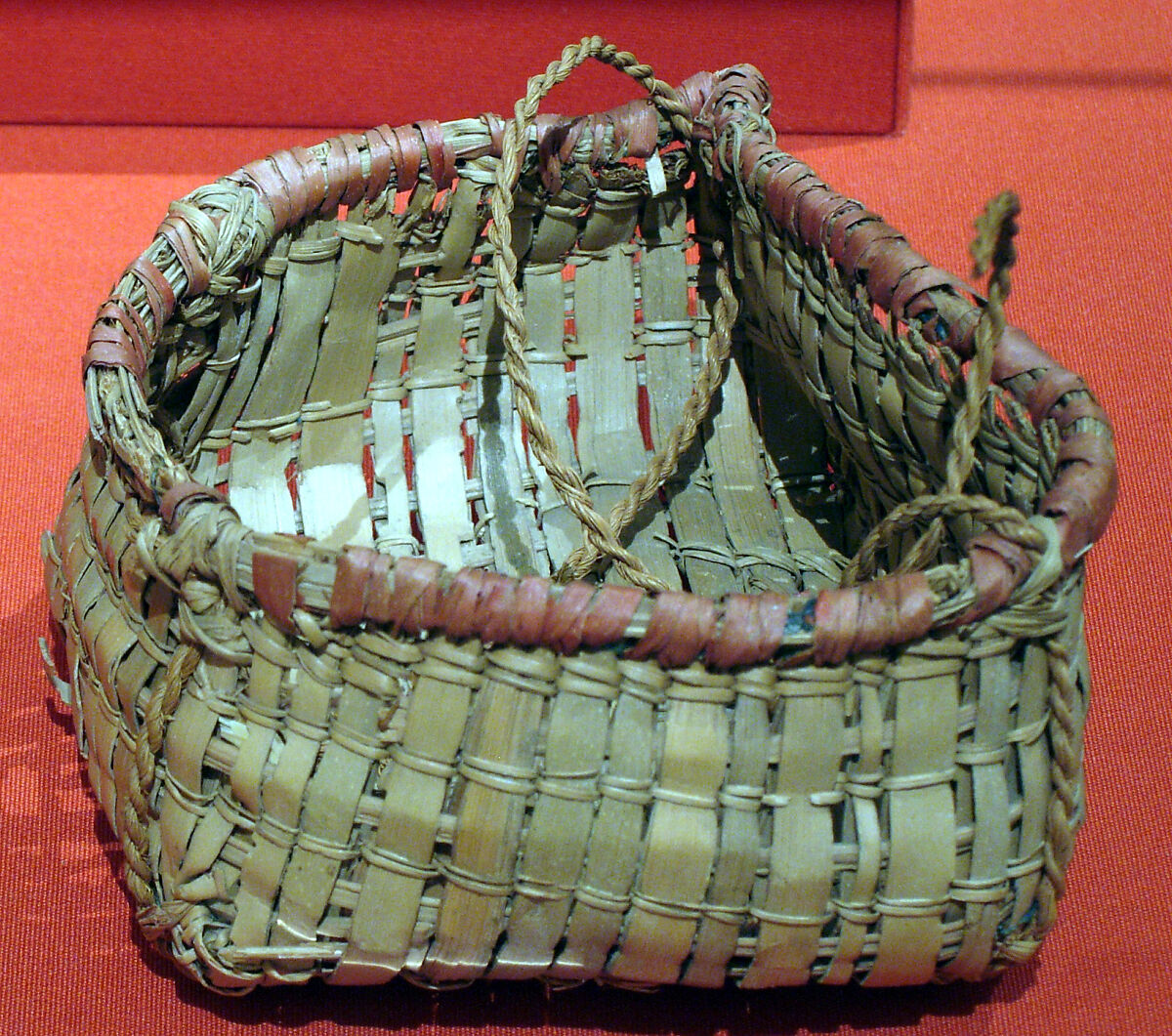 Basket, Palm leaves, grass, string, red dye 