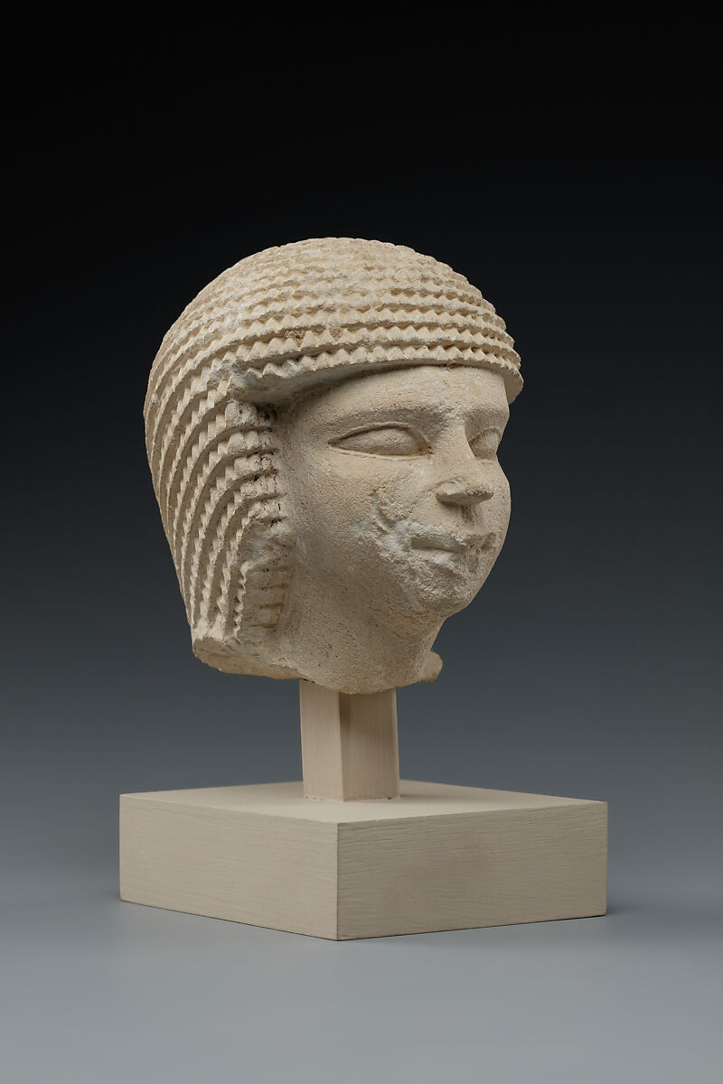 Head of male statue, Limestone