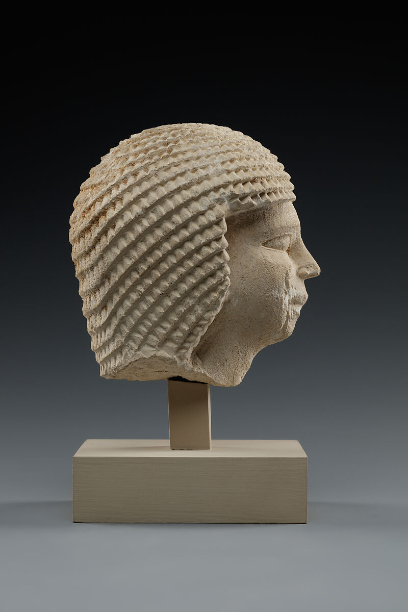 Head of male statue, Limestone