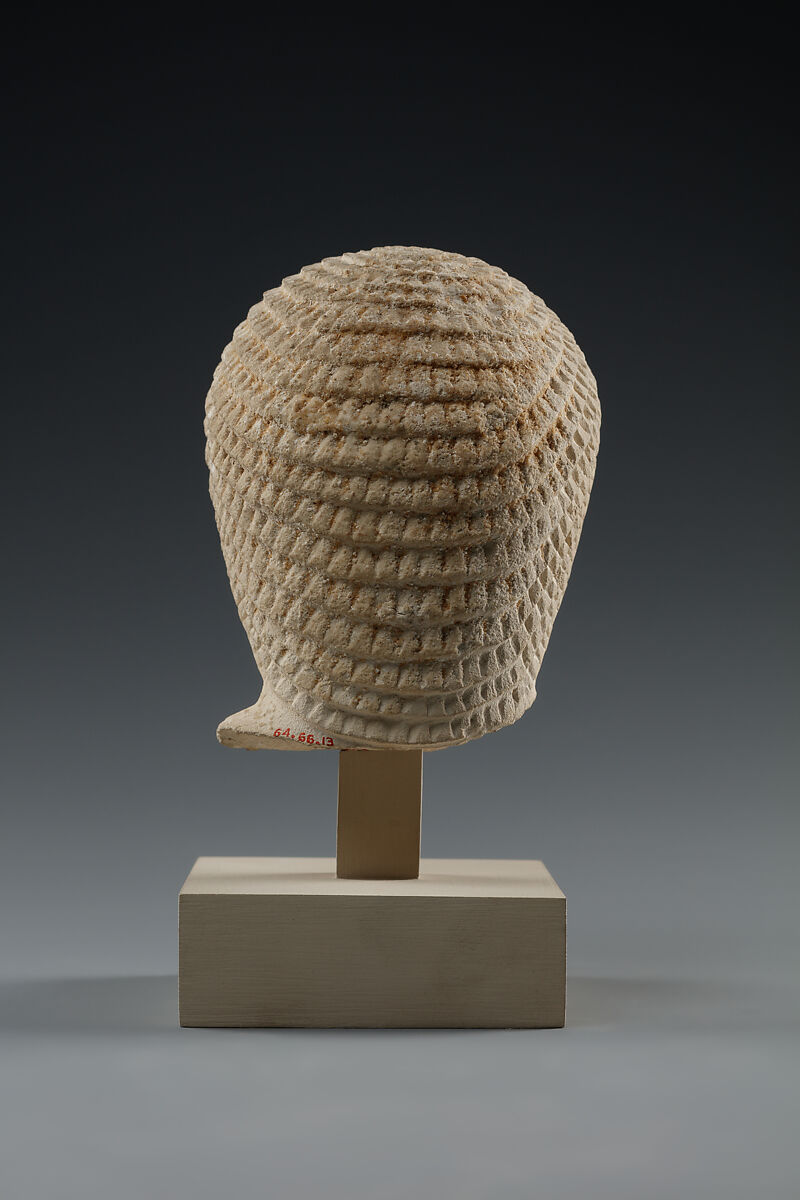 Head of male statue, Limestone