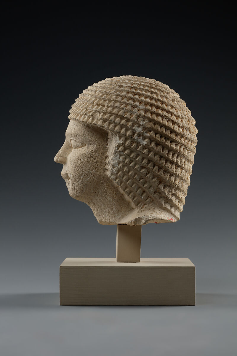 Head of male statue, Limestone