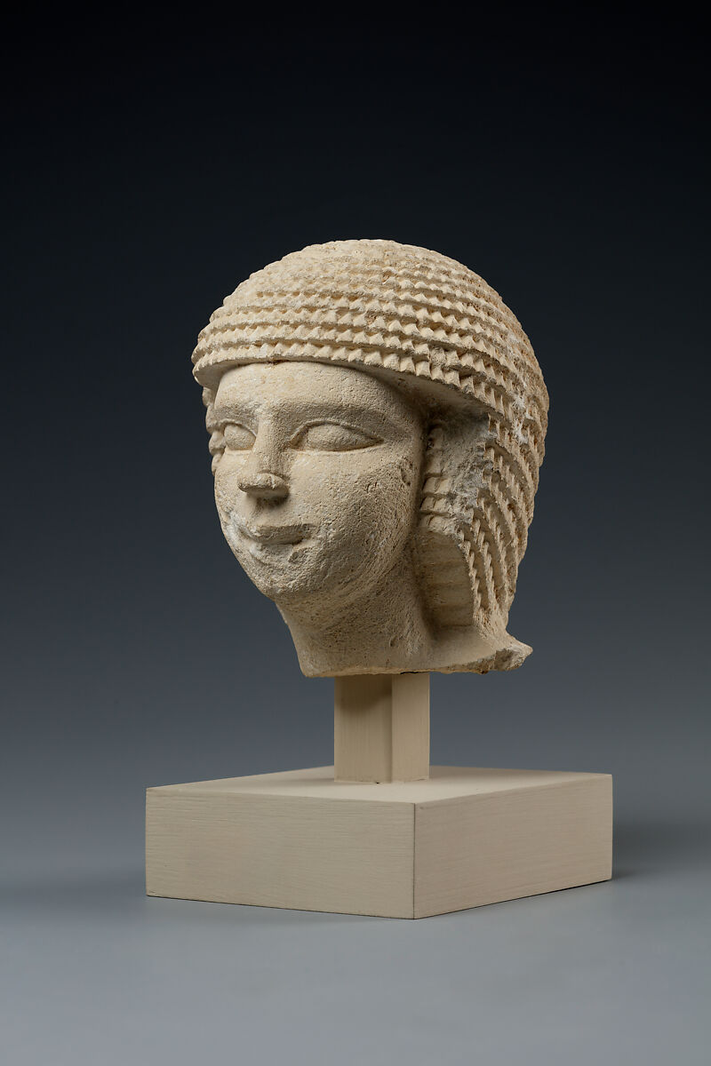 Head of male statue, Limestone