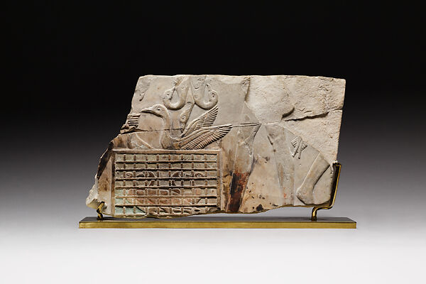Birds in a cage and offering bearers