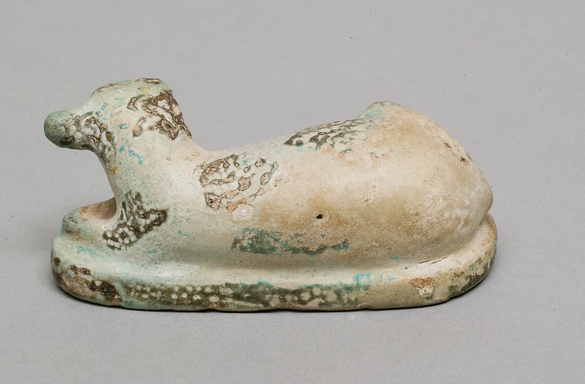 Figurine of a recumbent calf, Faience