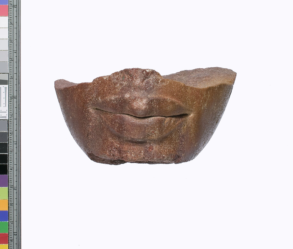 Lower part of a royal head, Red quartzite