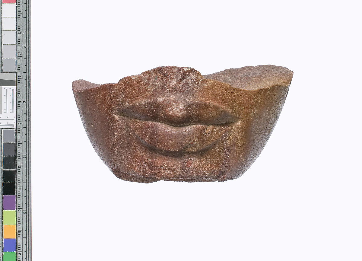 Lower part of a royal head, Red quartzite