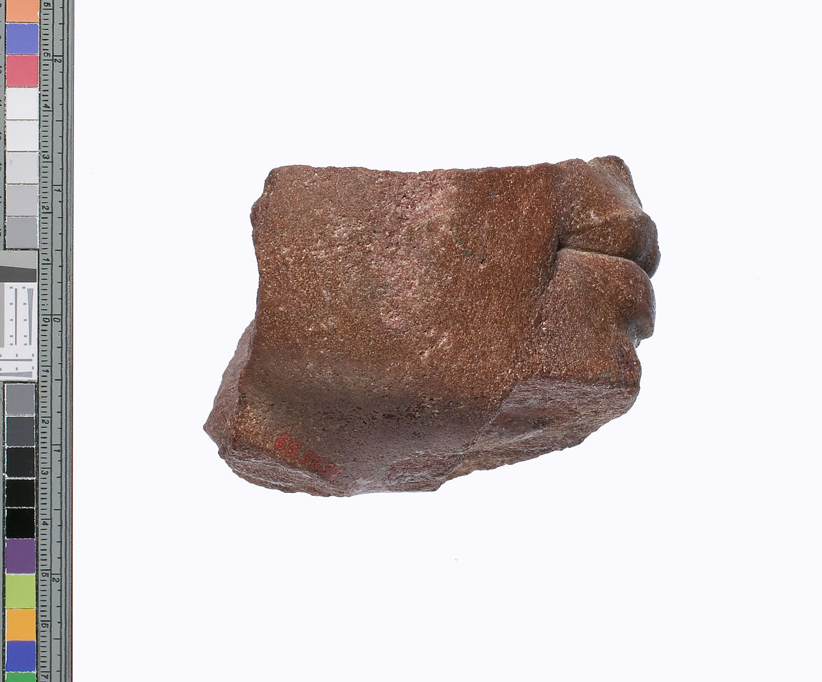 Lower part of a royal head, Red quartzite