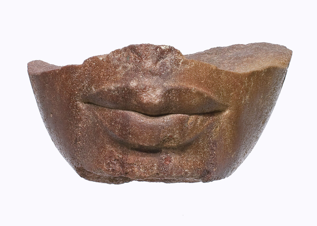 Lower part of a royal head, Red quartzite 