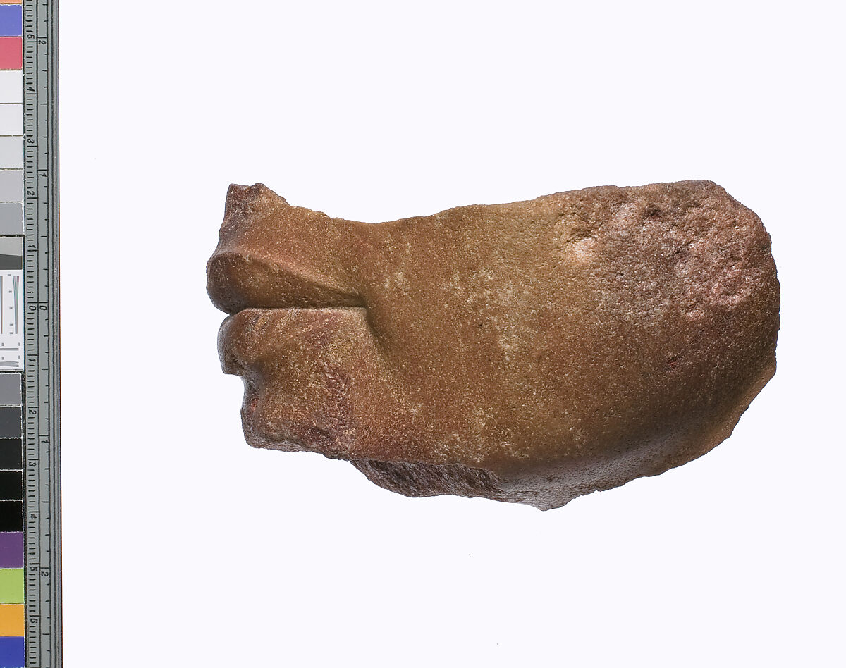 Lower part of a royal head, Red quartzite