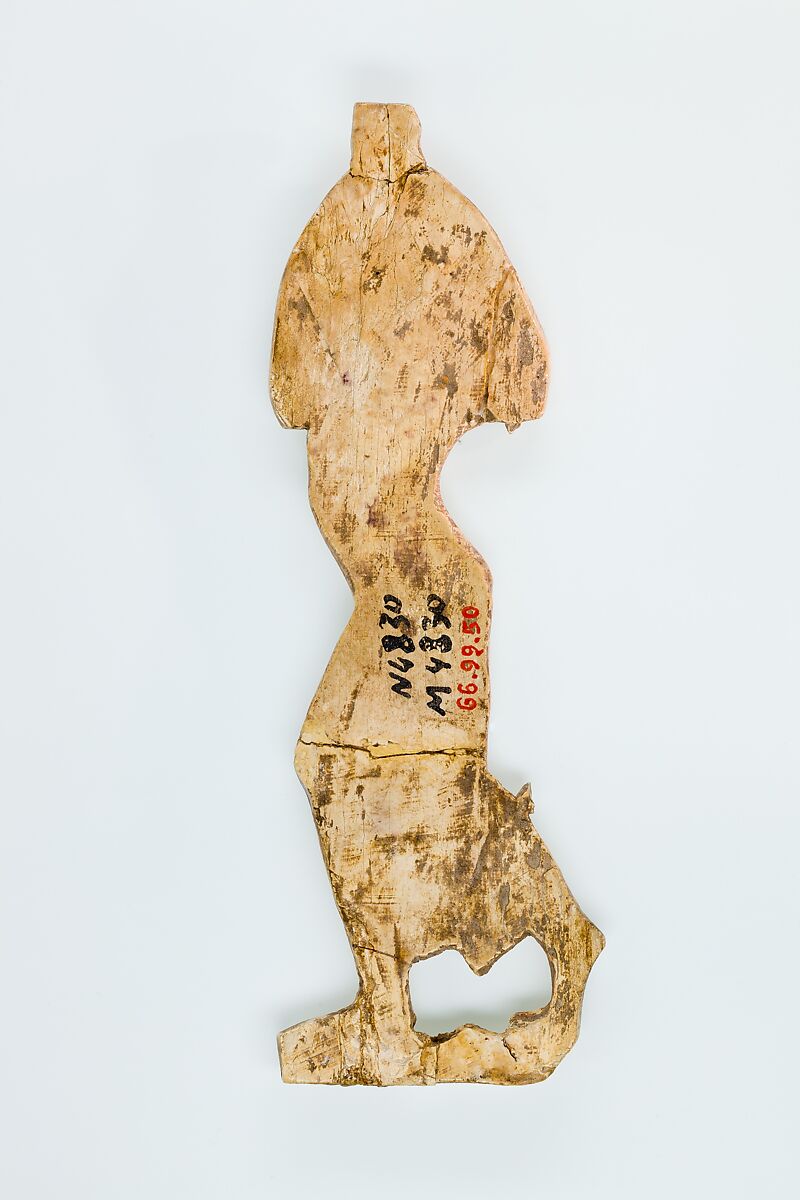 Figure of an Asiatic captive, Ivory, red and pink pigment, white ground