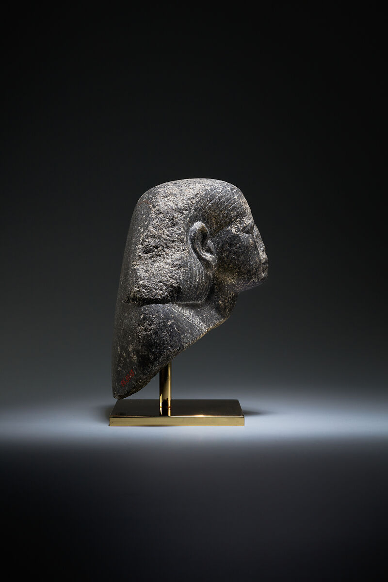 Head and shoulders of a male statue, Granodiorite