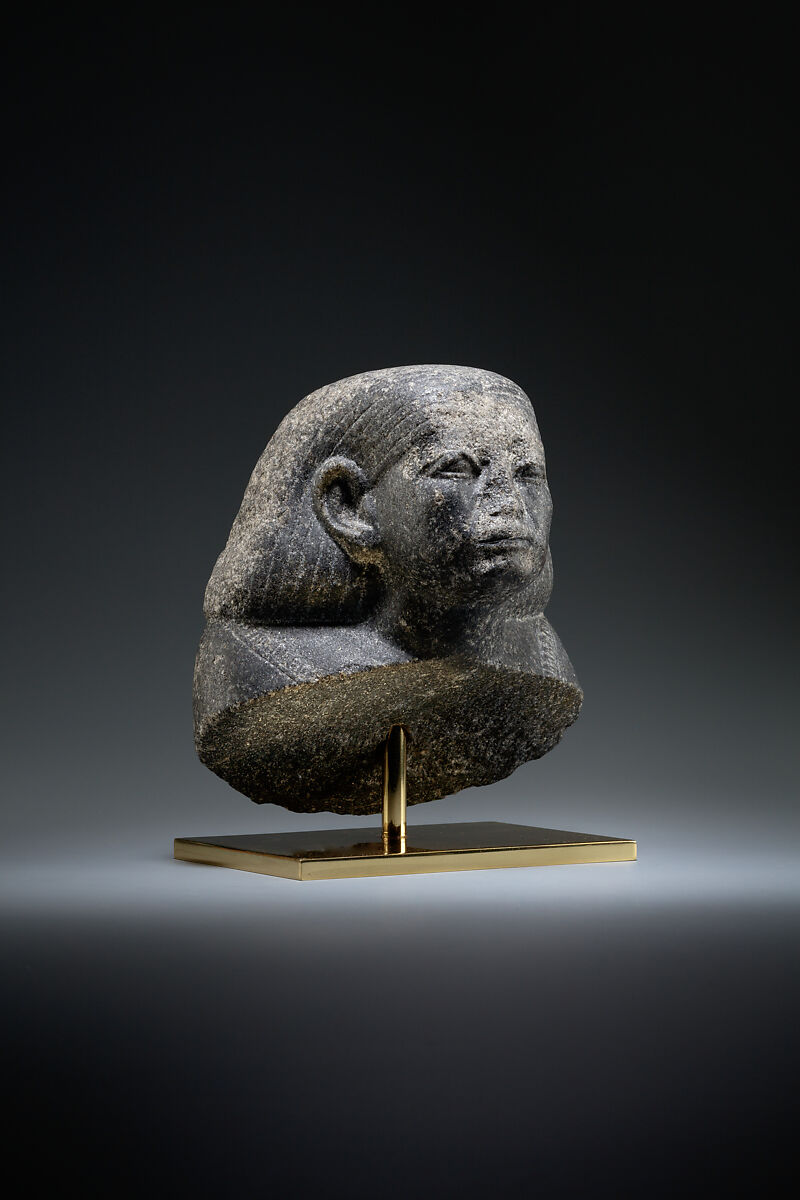 Head and shoulders of a male statue, Granodiorite