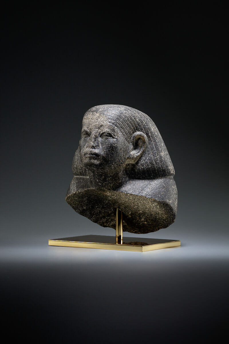 Head and shoulders of a male statue, Granodiorite