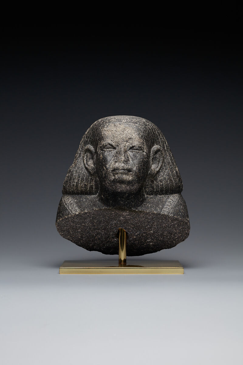 Head and shoulders of a male statue, Granodiorite