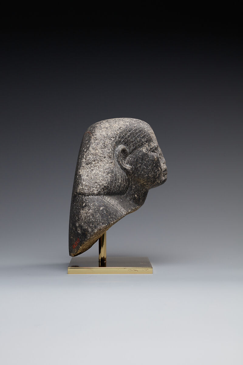 Head and shoulders of a male statue, Granodiorite