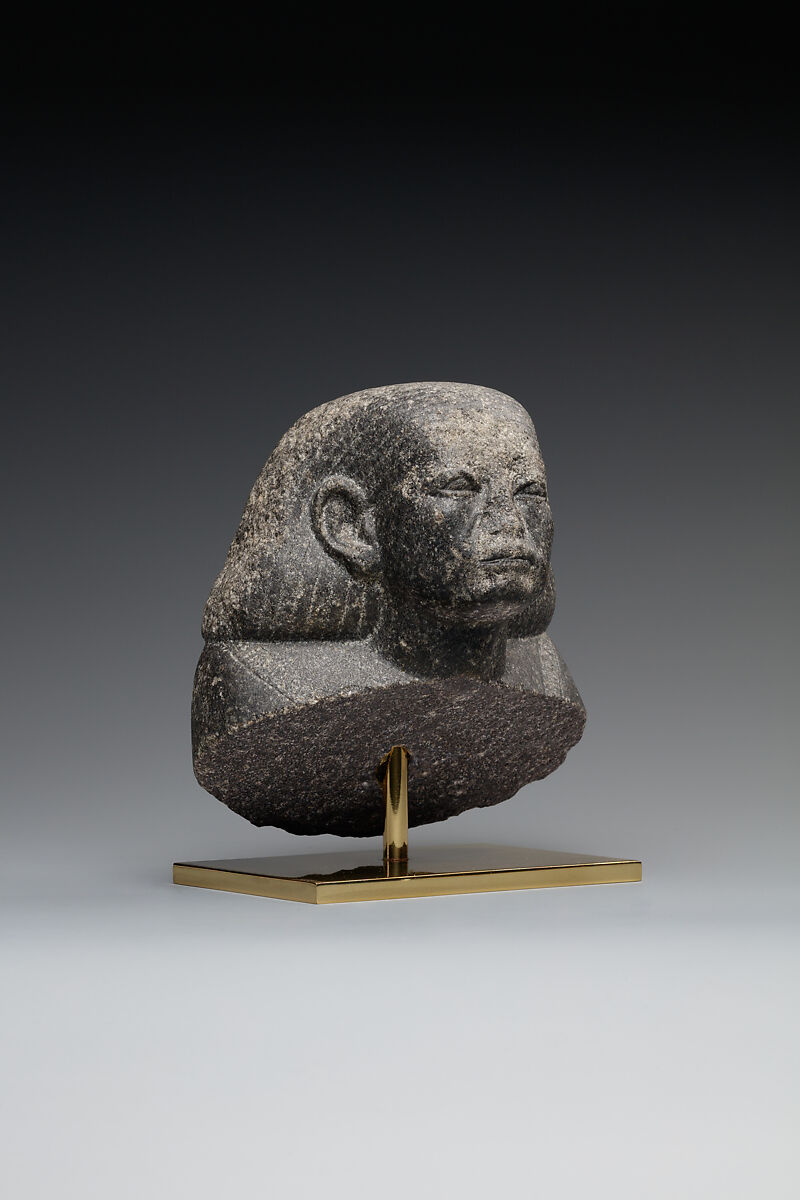 Head and shoulders of a male statue, Granodiorite