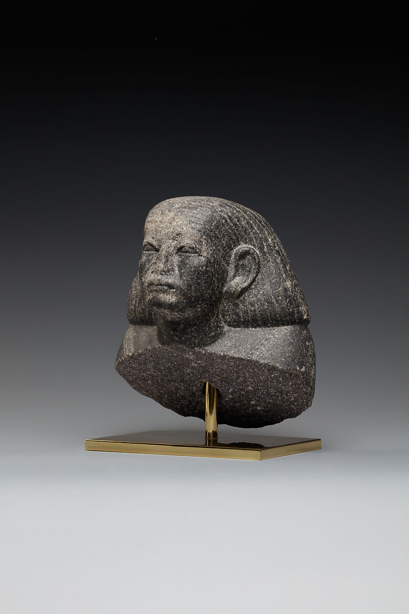 Head and shoulders of a male statue, Granodiorite