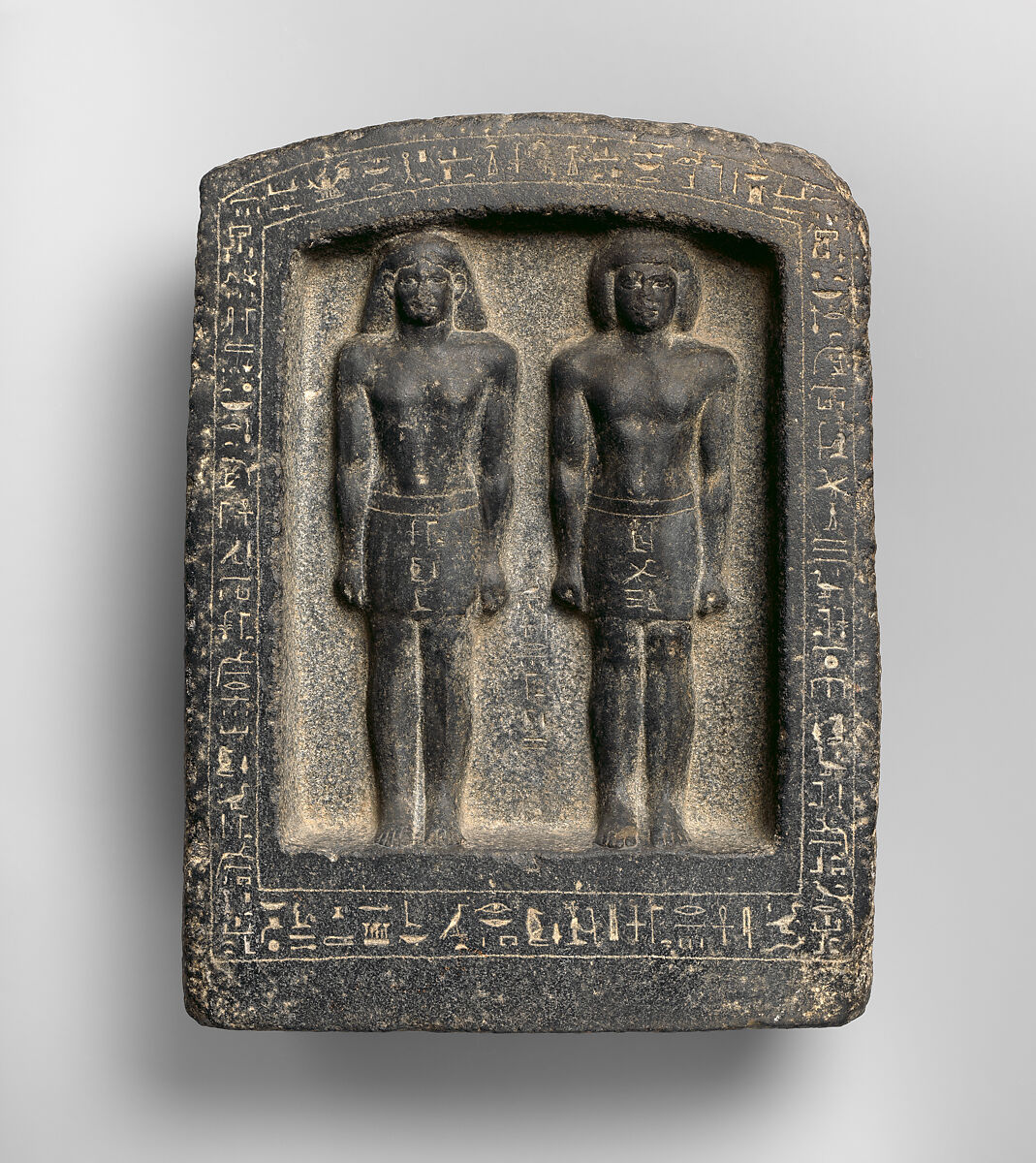 Naos stela with Pa-inmu and his father It, son of Pedise, Basalt