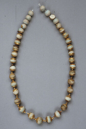 Globular Beads with Caps, Strung as a Necklace