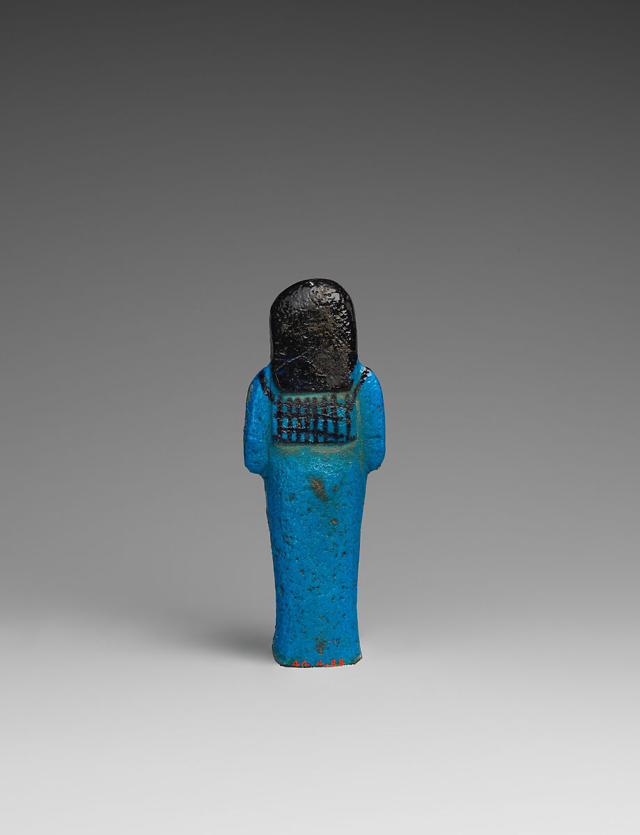 Shabti of the Adoratrice of Hathor Henettawy, wife of Painedjem I, Faience
