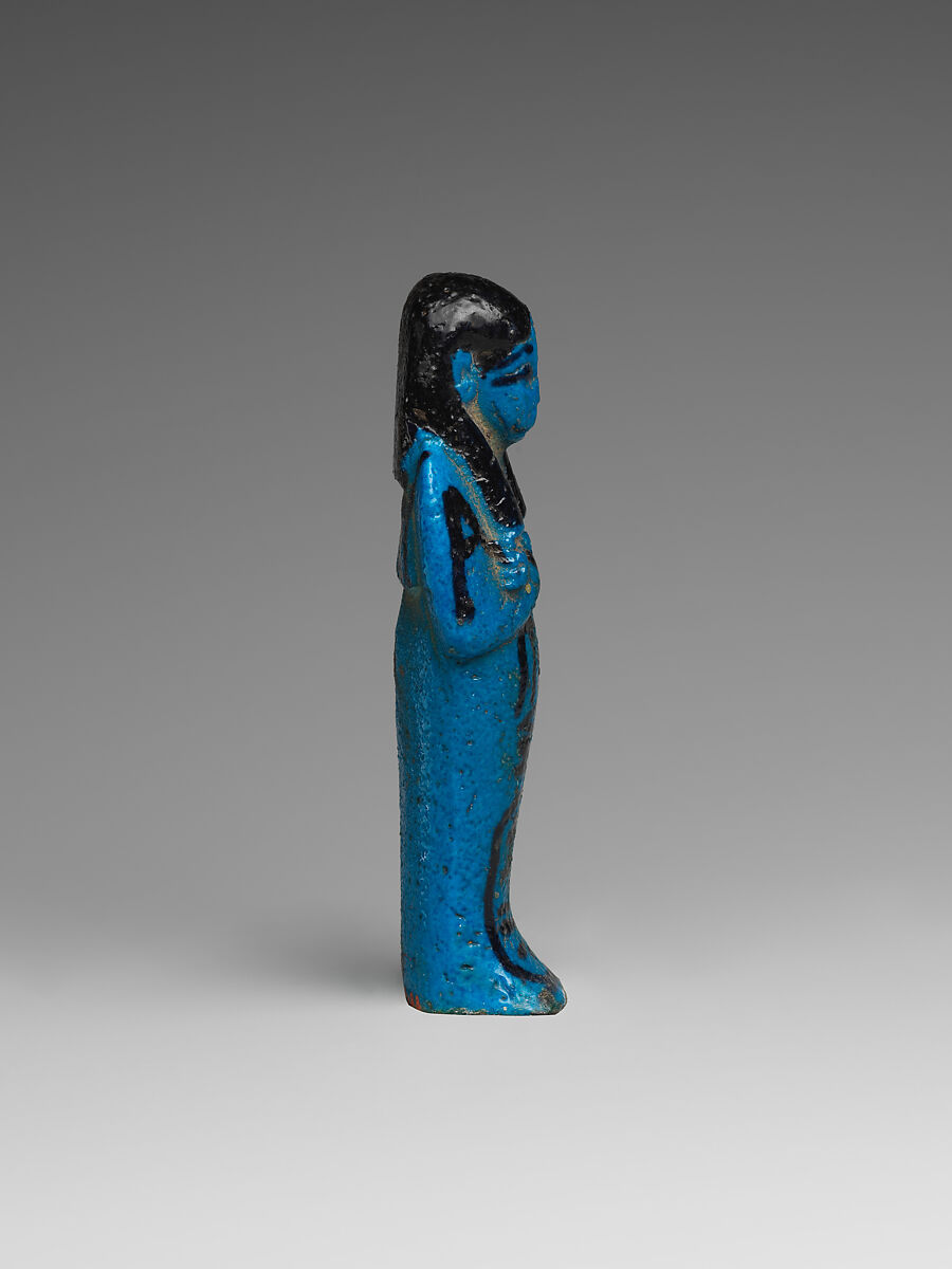 Shabti of the Adoratrice of Hathor Henettawy, wife of Painedjem I, Faience