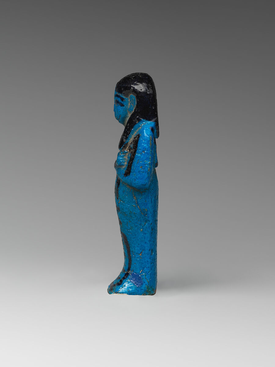 Shabti of the Adoratrice of Hathor Henettawy, wife of Painedjem I, Faience