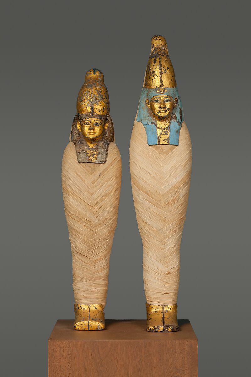 Mask and Foot Cover of  "Corn Mummy", Gilded wax on a reconstructed body of ancient linen