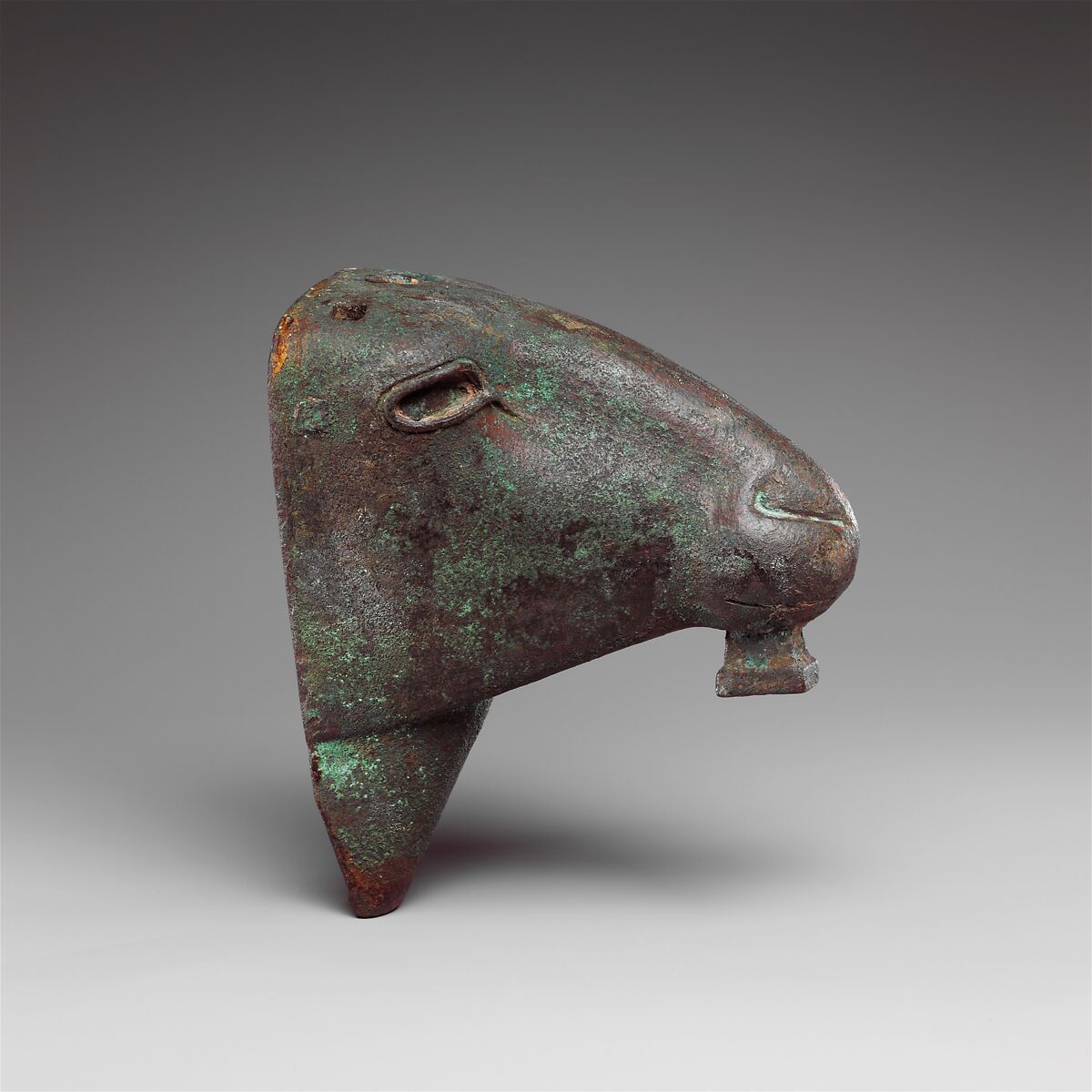 Ram head made for attachment to a barque, Leaded bronze, precious metal leaf, copper alloy inlay in eye rims