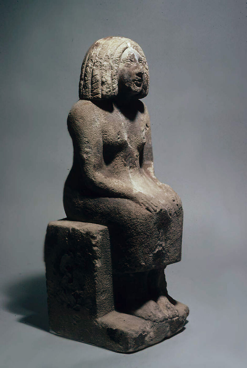 Seated woman, Sandy fossiliferous limestone 