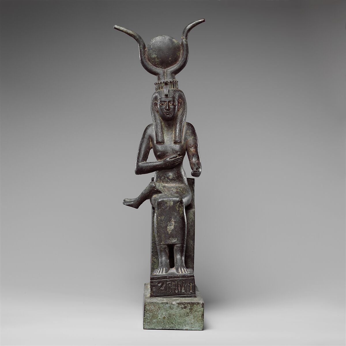 Statuette of Isis nursing Horus (missing above the legs), inscribed for Hor son of Padihorresnet, Bronze, gilded silver, electrum; separate leaded bronze throne