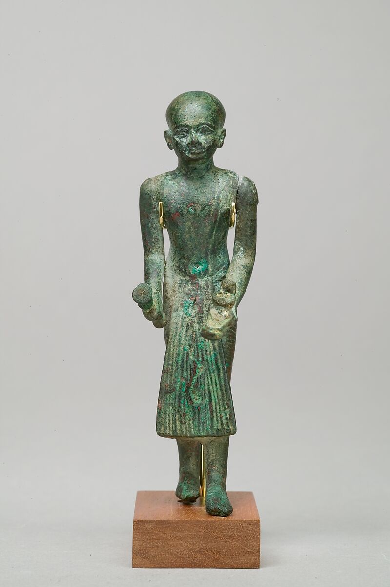 Priest with vase and censer, Leaded bronze, gold leaf on censer and vessel