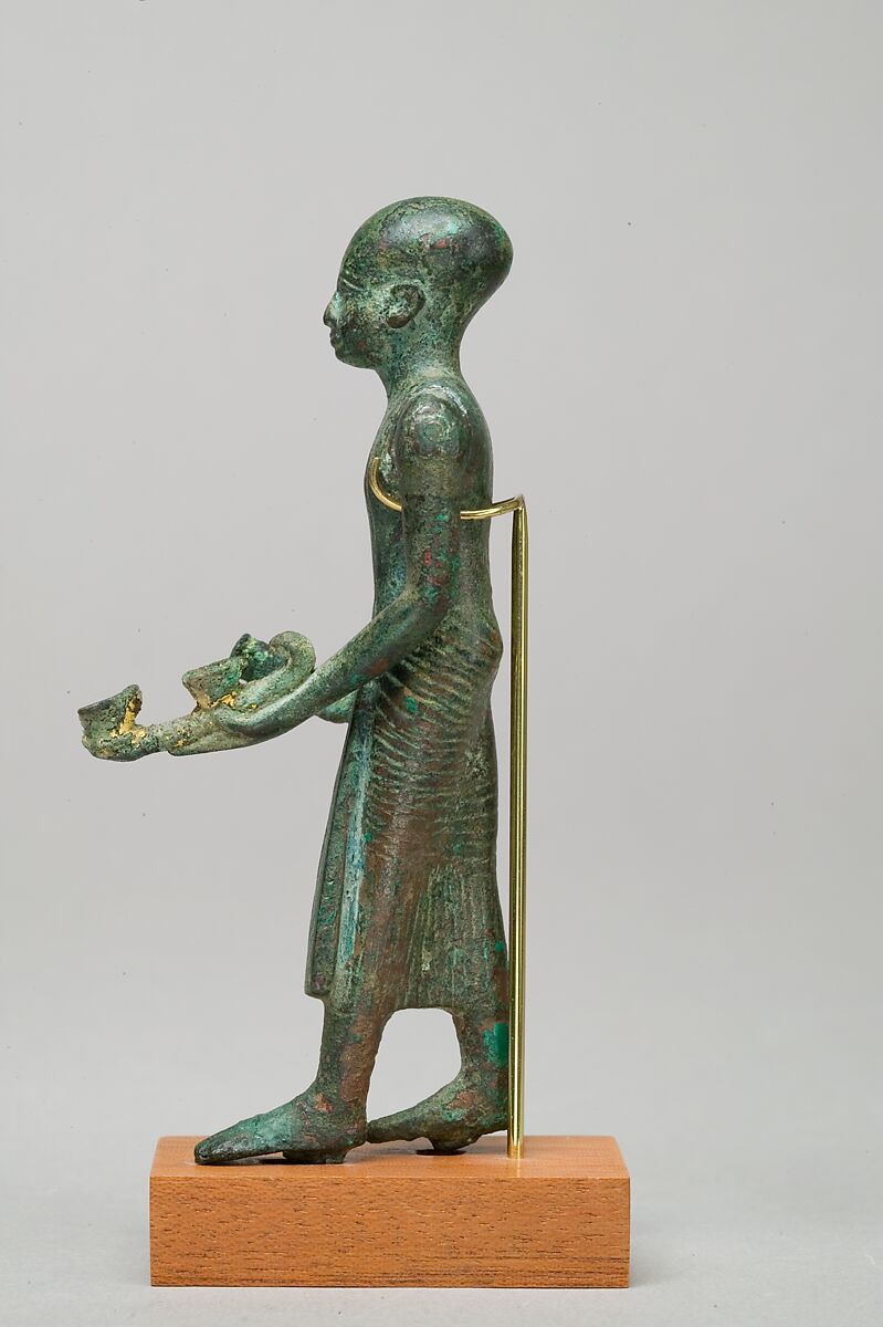 Priest with vase and censer, Leaded bronze, gold leaf on censer and vessel