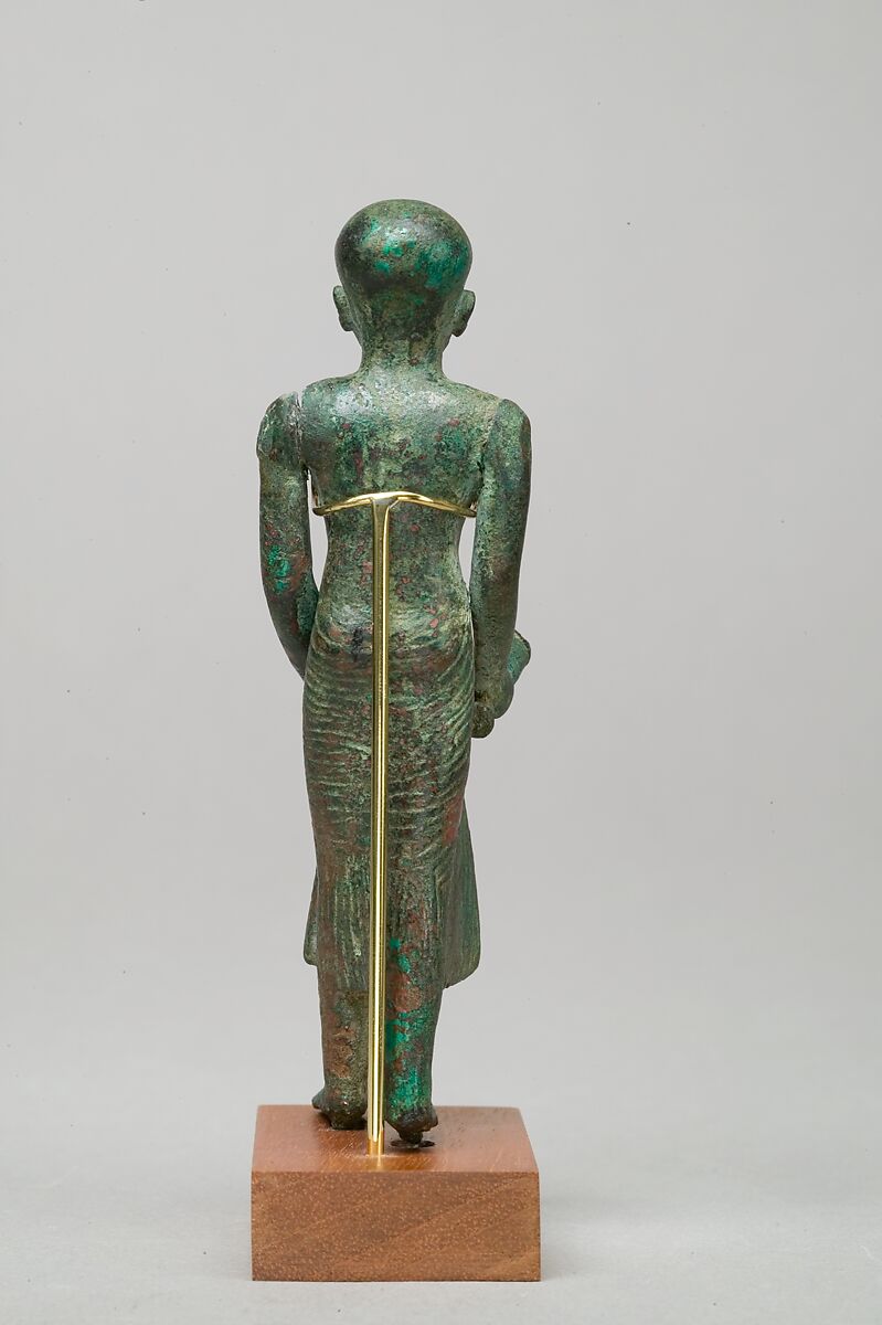 Priest with vase and censer, Leaded bronze, gold leaf on censer and vessel