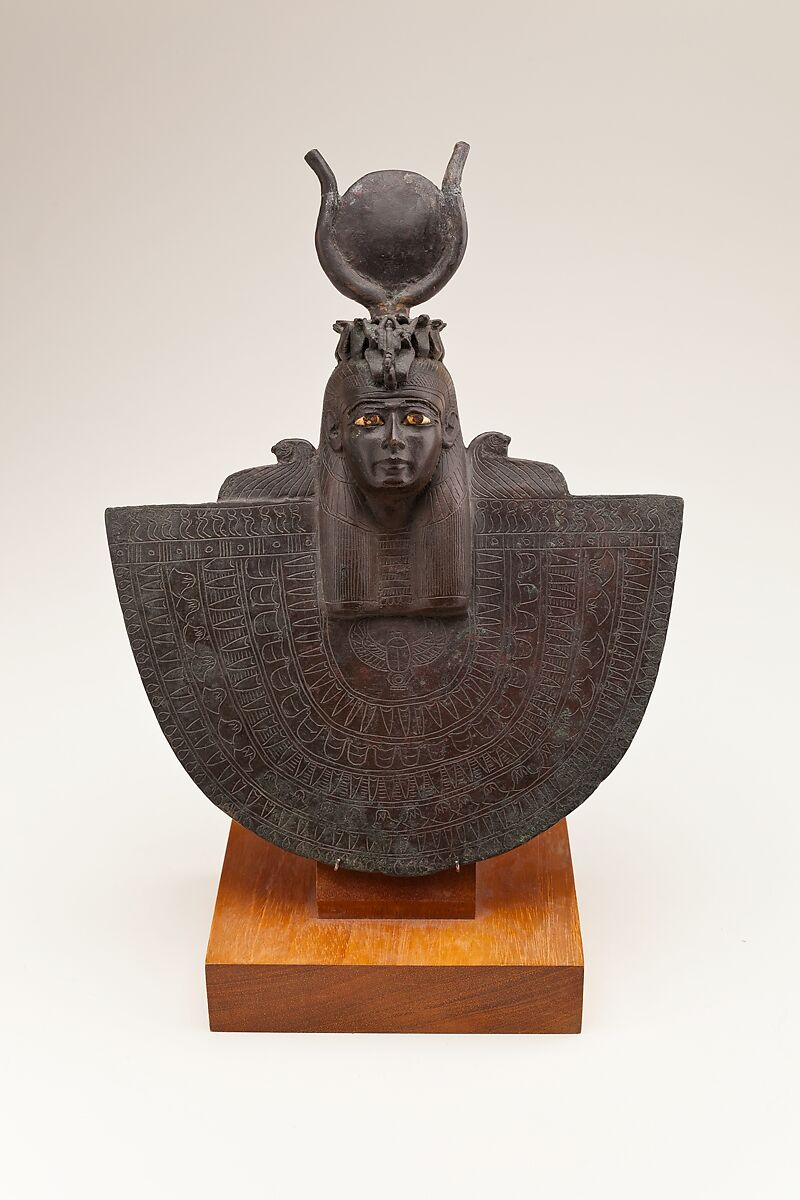 Aegis with the Head of Isis or Hathor, Bronze or copper alloy; stone, paint 